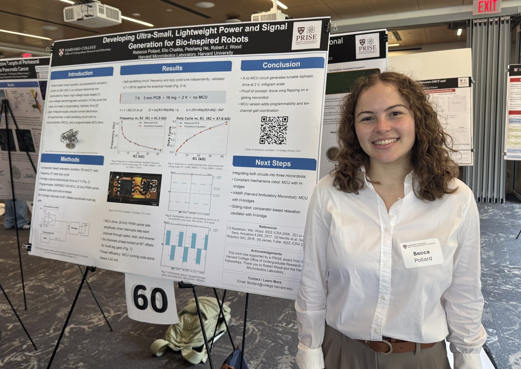 Becca standing beside a research poster titled Developing Ultra-Small, Lightweight Power and Signal Generation for Bio-Inspired Robots, at a poster session.
